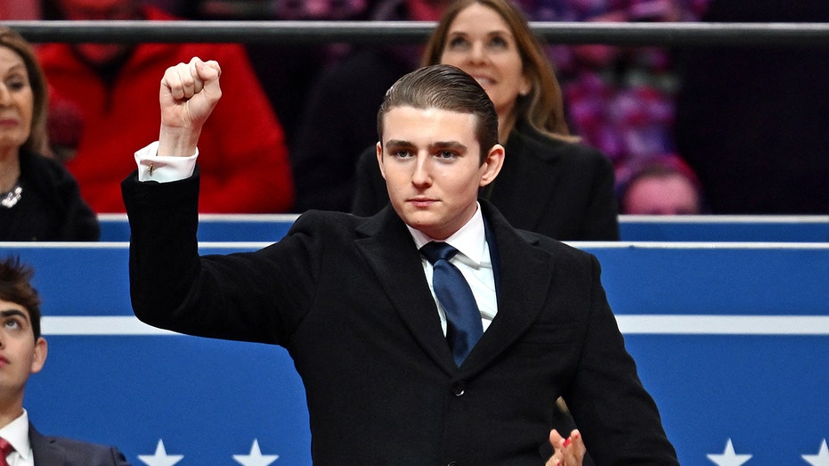 Barron Trump gestures