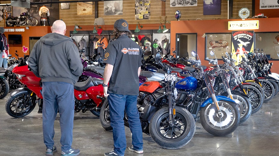 People in a Harley-Davidson store