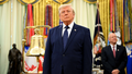 President Donald Trump stands next to a bell before ringing it to open the New York Stock Exchange ahead of the launch of Trump investment accounts in the Oval Office. - Fox News