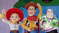Toy Story characters Jessie, Woody and Buzz Lightyear pose upon a red carpet launch event of the film 'Toy Story 5' in London on May 28, 2026. - Fox News
