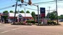 SUV at gas station pump