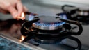 A person lights a gas cooker fire, on October 28, 2021, in Madrid, Spain.