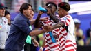 SANTA CLARA, CALIFORNIA - JULY 01: Mauricio Pochettino, Head Coach of the United States, speaks with Folarin Balogun #20 and Weston McKennie #8 of the United States during the FIFA World Cup 2026 Round of 32 match between USA and Bosnia and Herzegovina at San Francisco Bay Area Stadium on July 01, 2026 in Santa Clara, California. - Fox Business News