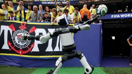 Boston Dynamics' Atlas, an advanced humanoid robot, performs at the 2026 FIFA World Cup on Sunday, July 5, 2026.  - Fox Business News