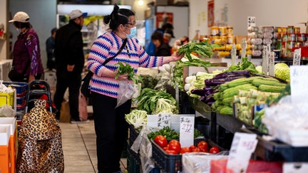 A shopper selects produce at a store in the Chinatown district of San Francisco, California, US, on Wednesday, May 13, 2026.  - Fox Business News