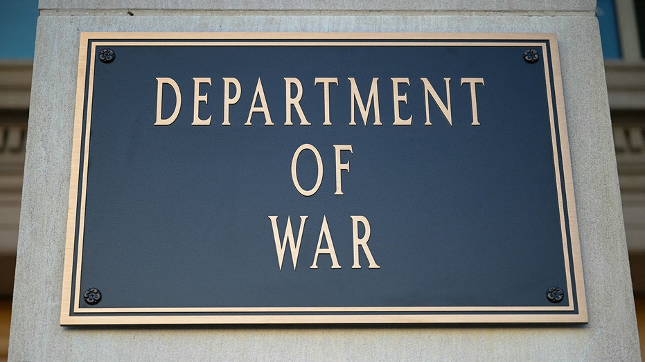 A sign reading "Department of War"