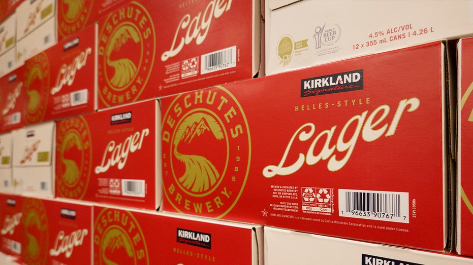red cases of Kirkland Signature Helles-Style Lager