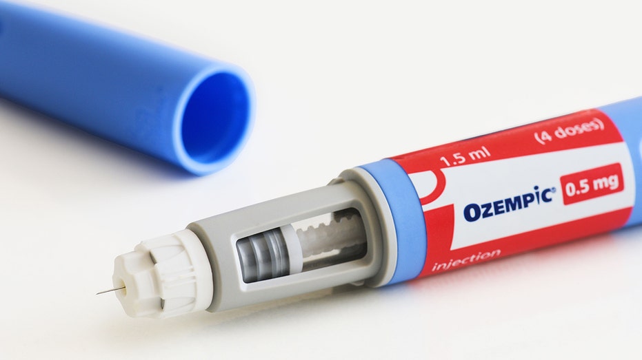 A photo illustration of Ozempic pen