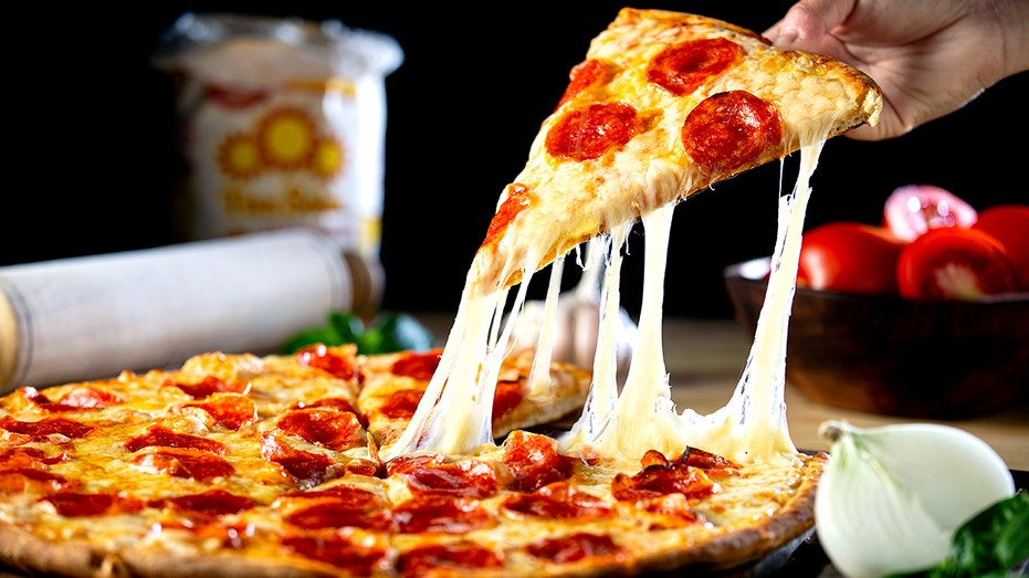 Pizza slice with cheese.