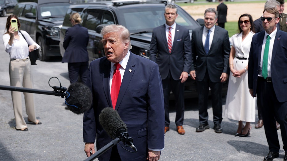 trump speaks to press outside