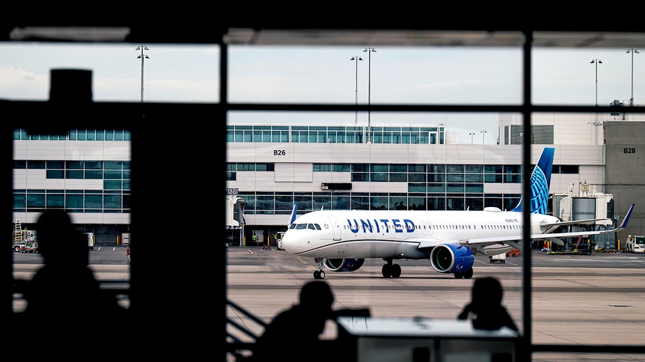 United Airlines passengers at the gate.