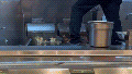 A video taken inside a Panda Express restaurant in Milwaukee, Wisconsin, purportedly showed a worker standing around food while cleaning a frying station area. - Fox News