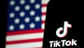 HONG KONG, CHINA - JANUARY 18: In this photo illustration, the TikTok logo and flag of the United States are seen on screens on January 18, 2025 in Hong Kong, China. As the impending TikTok ban looms, users are increasingly migrating to alternative platforms like Xiaohongshu, driven by concerns over data privacy and the potential shutdown of their favorite app. This shift reflects a broader trend where users seek platforms that offer similar engagement without the uncertainty surrounding TikTok's future in the U.S., especially as legal battles and political pressures mount ahead of the January 19 deadline for compliance or a ban. (Photo by Anthony Kwan/Getty Images) - Fox News
