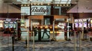 Gaming machines are visible through the main entrance to the Bally's casino at Medinah Temple, Sept. 8, 2023, in Chicago. The casino opened a day later. - Fox Business News