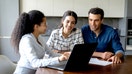 A couple meets with a financial advisor in her office. - Fox Business News