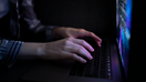 An individual types on a laptop keyboard. OpenAI released a letter on Aug. 27 warning about AI-enabled cyberattacks. - Fox Business News