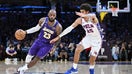 LeBron James of the Los Angeles Lakers dribbles the ball against Dominick Barlow of the Philadelphia 76ers during the second half of the game between the two teams at Crypto.com Arena on February 05, 2026 in Los Angeles, California. - Fox Business News
