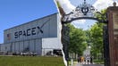 A SpaceX facility and Harvard University campus are shown. Harvard Management Company disclosed a $2.2 billion stake in Elon Musk&rsquo;s rocket company. - Fox Business News