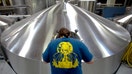 Brewmasters at the Stone Brewing Company in Escondido keep an eye on the process in the giant stainless steel vats. - Fox Business News