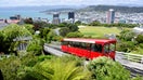 A cable car travels above the central business district in Wellington, New Zealand. - Fox Business News