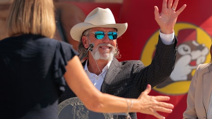 Buc-ee's co-founder and CEO Arch "Beaver" Aplin III wave during the grand opening ceremony of the first Buc-ee's location on the East Coast on June 30, 2025 in Mount Crawford, Virginia. - Fox Business News