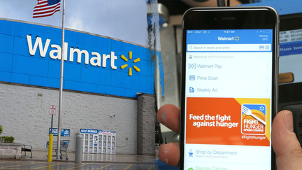 A Walmart storefront is pictured alongside the retailer&rsquo;s mobile payment app. - Fox Business News