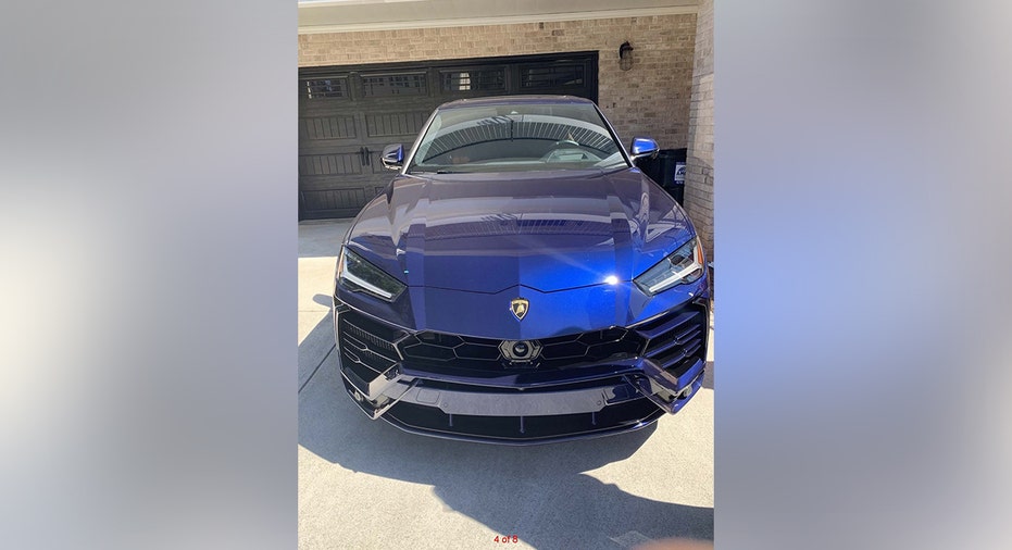 A luxury car forfeited in the Atlanta Amazon fraud case