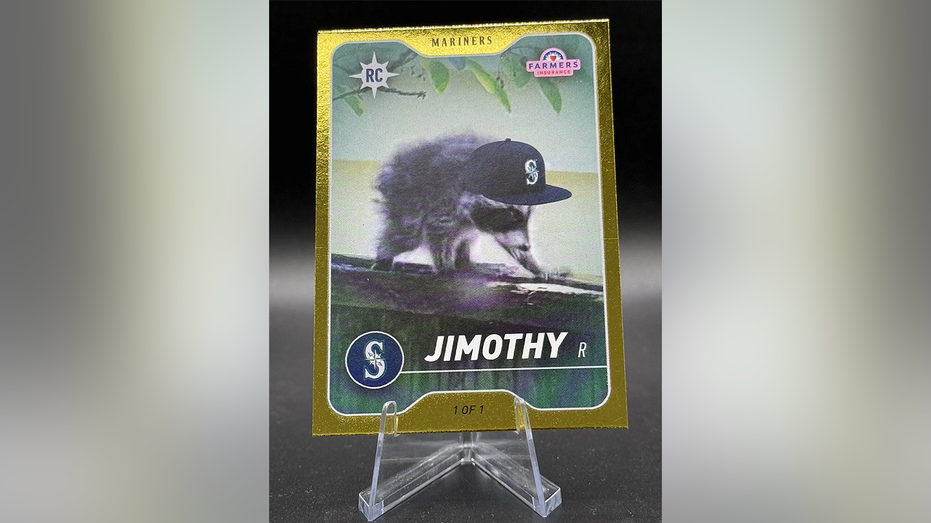 One-of-one gold Jimothy rookie card featuring Seattle's viral raccoon and the Mariners logo