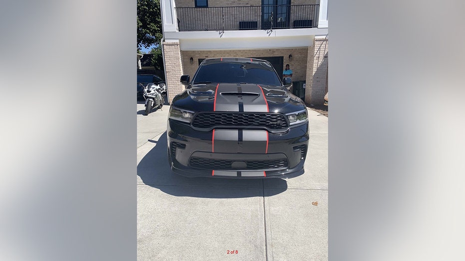 A luxury car forfeited in the Atlanta Amazon fraud case