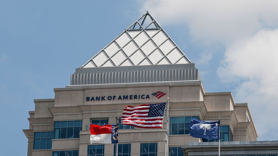 Bank of America signage and an American flag on a building in Charlotte, North Carolina