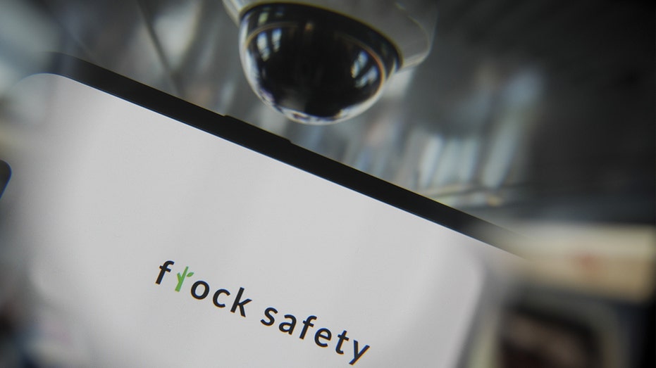 In this photo illustration, Flock Safety logo is being displayed on a mobile phone screen on March 20, 2025.