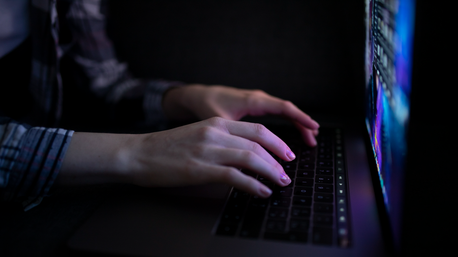 Laptop typing stock image