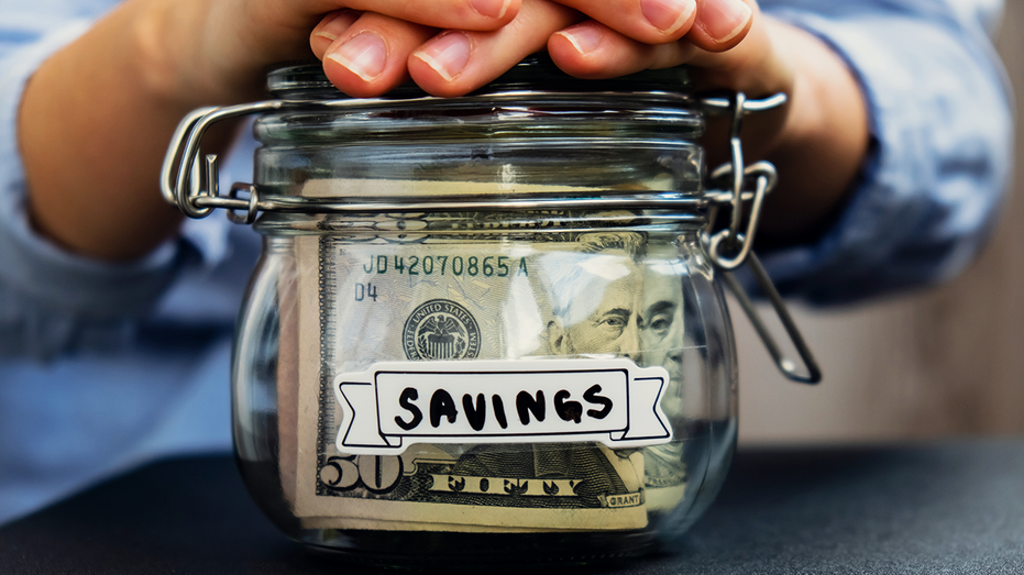 Savings jar with money in it.