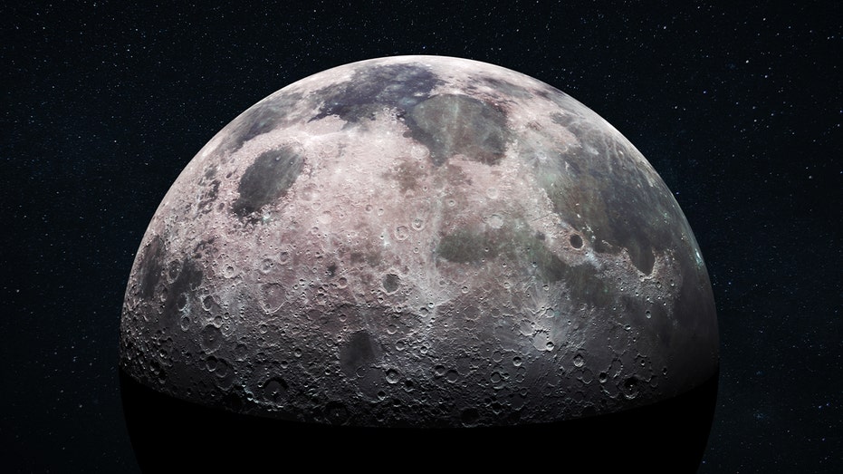 Space view of the moon's cratered surface with a star-filled outer space background. Deep space exploration and astronomy concept. Moon with detailed craters and surface.
