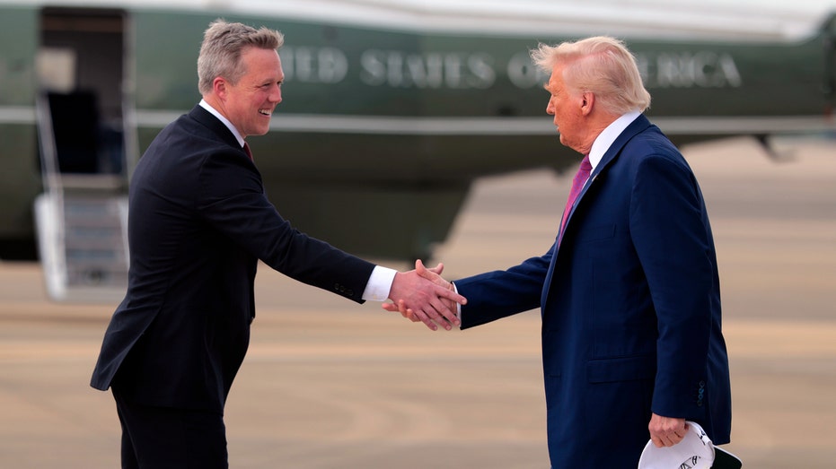 President Donald Trump and Army Secretary Dan Driscoll
