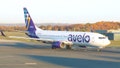 An Avelo Airlines aircraft parked on an airport tarmac. - Fox News