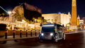 A Zoox robotaxi driving down the Las Vegas Strip in front of the Luxor Hotel & Casino. - Fox News