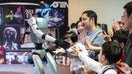 Robot interacts with audience during the Artificial Intelligence Robot Exhibition on Sept. 6, 2025, in Guangzhou, China. - Fox Business News