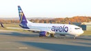 An Avelo Airlines aircraft parked on an airport tarmac. - Fox Business News