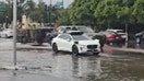A Waymo vehicle gets stuck on a flooded Phoenix street  as it became stuck in an "AI loop," one witness said.  - Fox Business News