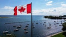 A Canadian flag flies along the waterfront of Lake Ontario, in Toronto, Ontario, Canada, on August 27, 2026. - Fox Business News