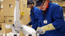 A Corning fiber technician works at the company&rsquo;s fiber optic manufacturing facility as AT&T expands its fiber network to meet growing AI and data demands. - Fox Business News