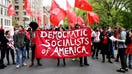 Members of the Democratic Socialists of America gather outside of a Trump-owned building on May Day on May 1, 2019, in New York City. - Fox Business News