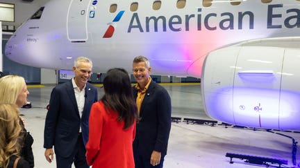 American Airlines CEO Robert Isom, left, attends the unveiling of an American Eagle Embraer ERJ-175 at Dallas Fort Worth International Airport on April 29, 2026. - Fox Business News