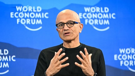 Microsoft CEO Satya Nadella gestures as he speaks during the World Economic Forum (WEF) annual meeting in Davos on January 20, 2026. - Fox Business News