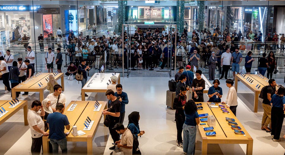 Customers inside an Apple store in Malaysia.
