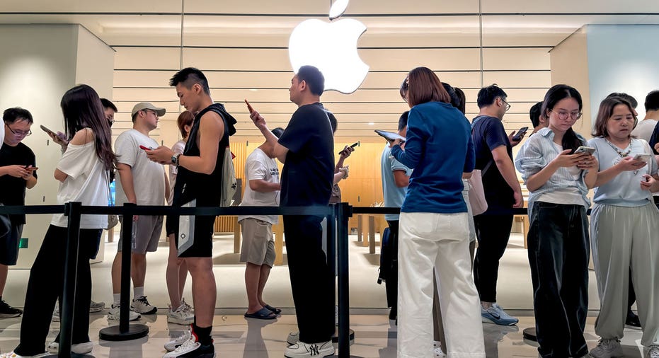 Customers in line at an Apple store in China.
