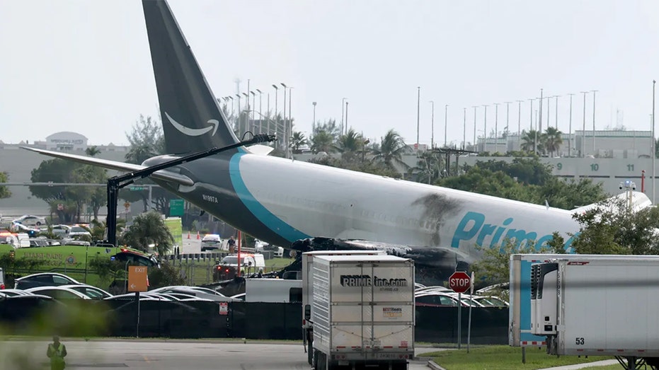An Amazon cargo plane is seen crashed