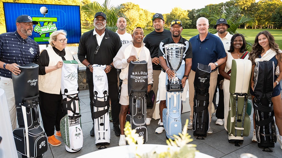 Winners from the PitCCh In Foundation 6th Annual Golf Classic, including Gary Sheffield, Ja Rule, Taijuan Walker and Stephen Malbon, celebrate at Alpine Country Club in New Jersey.