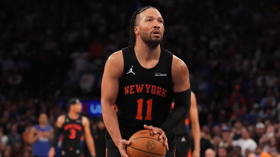 Jalen Brunson looks on court